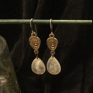 Drop earrings in filigree gold tone and cream faceted beads. 2” drop
